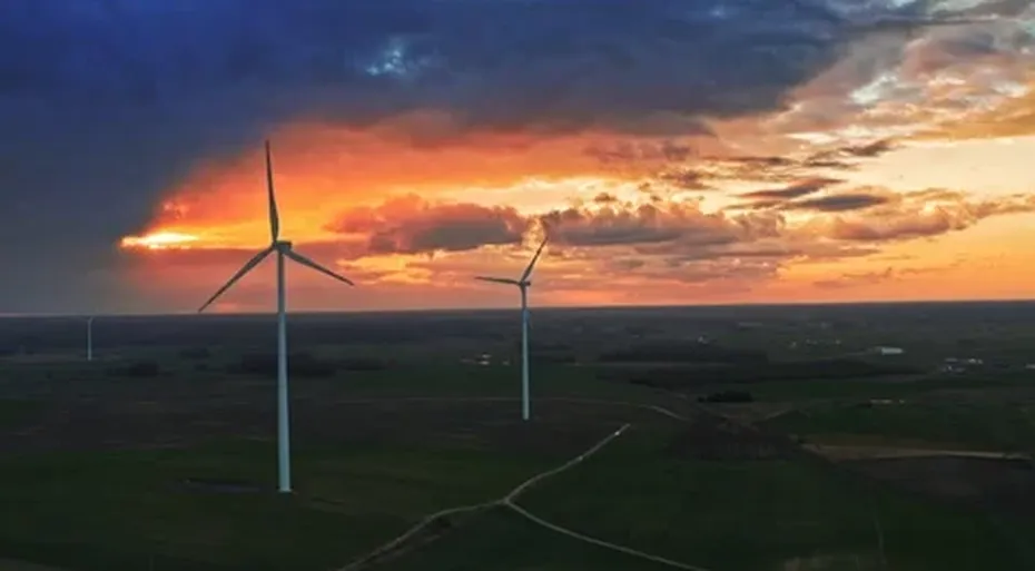 Wind turbines sunset landscape